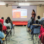 Addressing the students and faculty