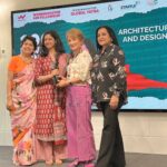 Receiving the award from Tripti Shinghal Somani (Founder, Womennovator), Ar. Sonali Bhagwati (Chief Guest), and Ar. Sabeena Khanna (Leader, Womennovator)