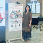 Apurva with the WICCI-KAC Standee